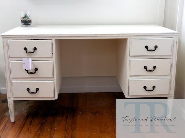 White vintage store desk with drawers